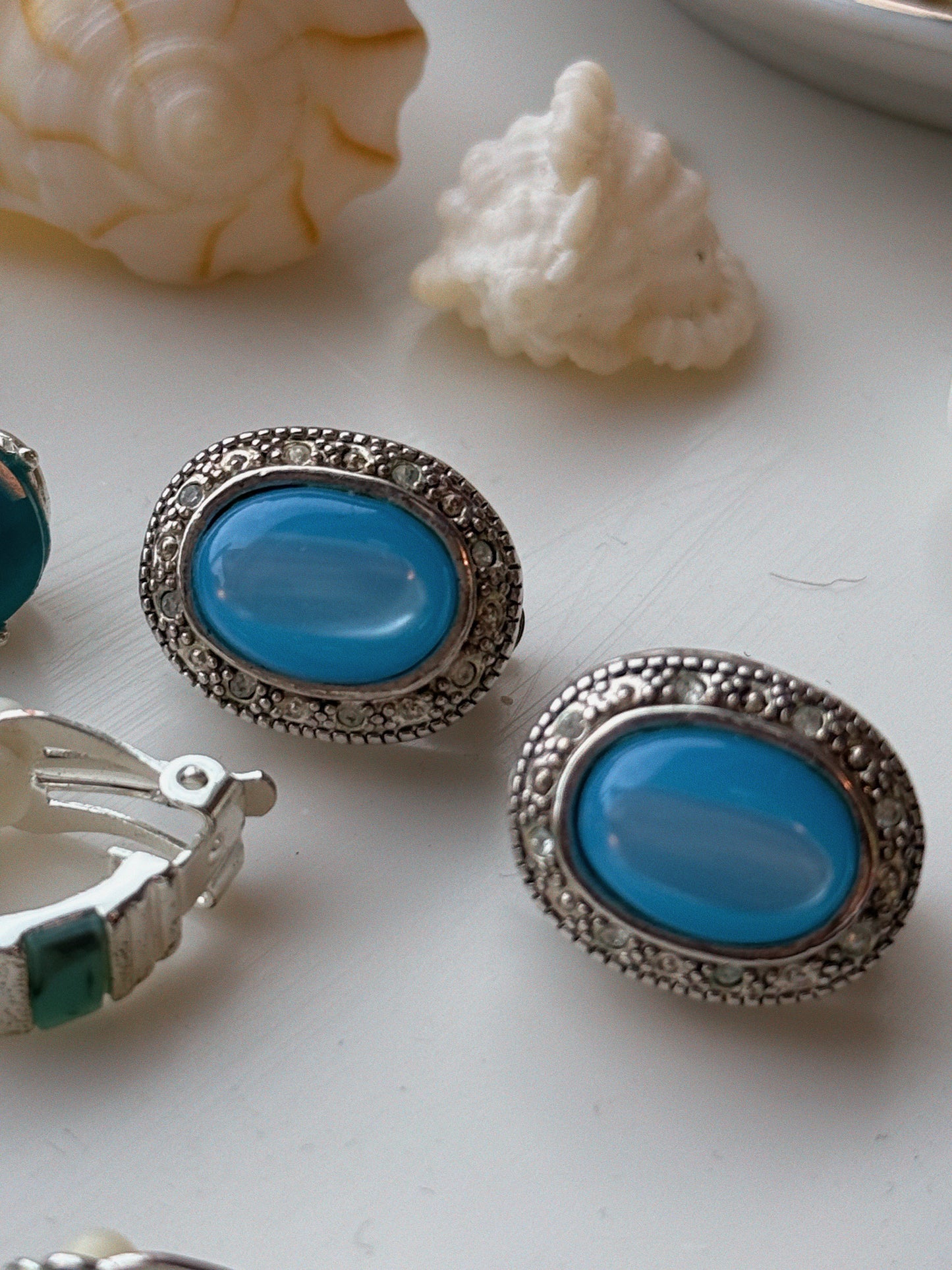 "Glowing Waters" Vintage Clip-On Earrings with Blue Cabochon and Rhinestones Signed Best